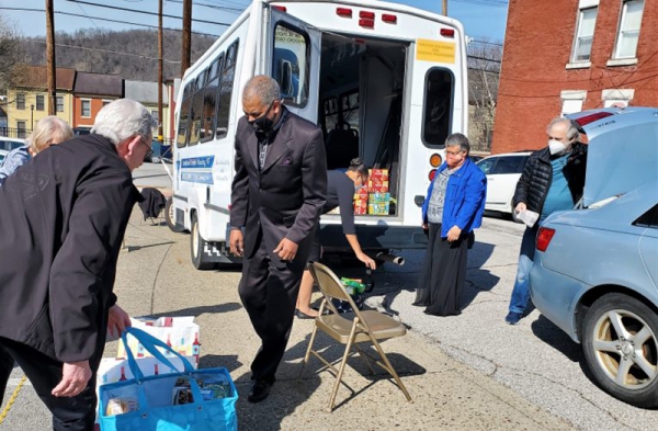 Photo for Rev. Darrell Cummings Gets Assistance to ‘Stuff the Bus’